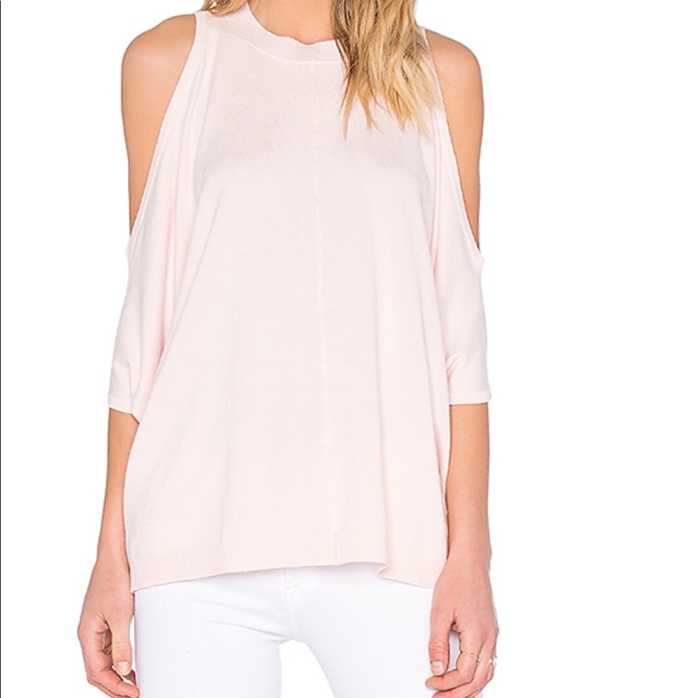 Central Park West Cold shoulder poncho sweater.